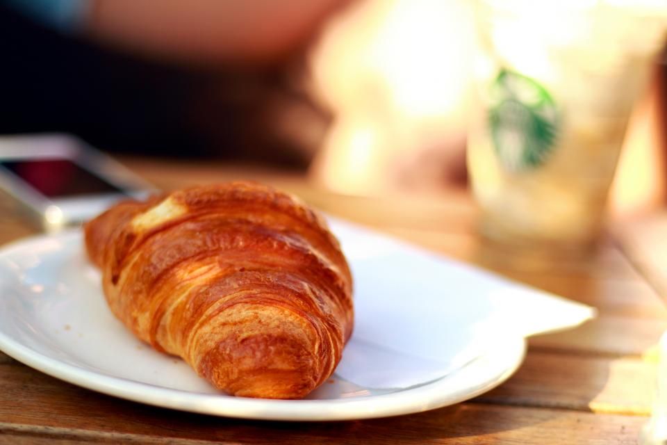 Pastries and coffee on the counter